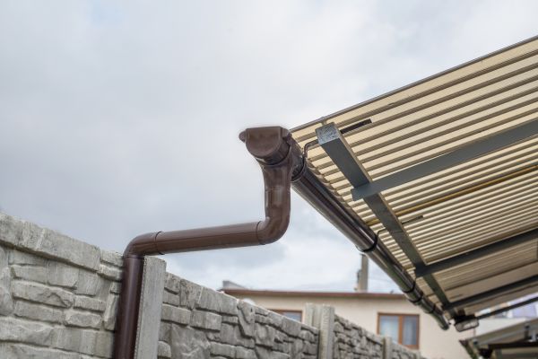 Plastic Downspout Installation in Columbia